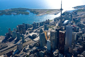 toronto-cbd A bird's eye view of downtown Toronto, showing the CN Tower and Toronto Island on a clear day